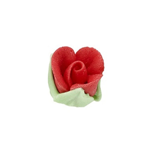 Mini red royal icing rosebud with green leaves, hand-piped flower for cupcakes and cakes.