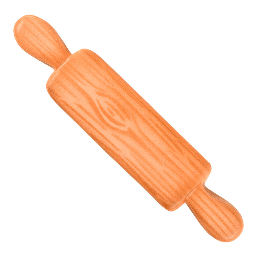 A decorated rolling pin-shaped cookie with a wood grain pattern and light brown icing.