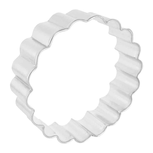 Angled side view of the fluted round cutter, emphasizing its depth and wavy border.