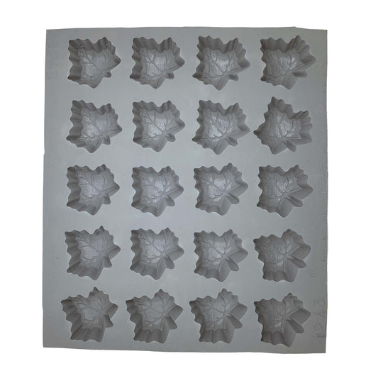 Full sheet of 20 deep maple leaf cavities in a natural rubber mold, ideal for fall-themed mints, chocolates, and decorative sweets