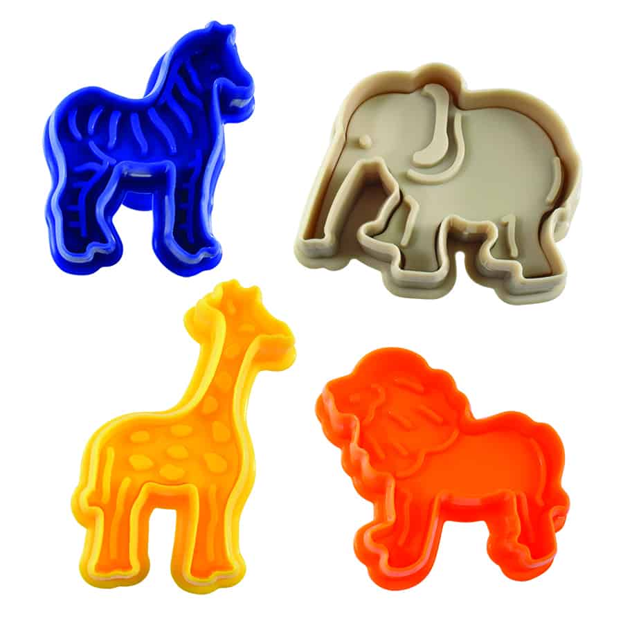 Close-up of four colorful cookie stampers with embossed animal designs.