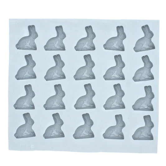 Full sheet of 20 small rabbit-shaped cavities in a natural rubber mold, ideal for Easter treats, baby showers, or seasonal candy making.