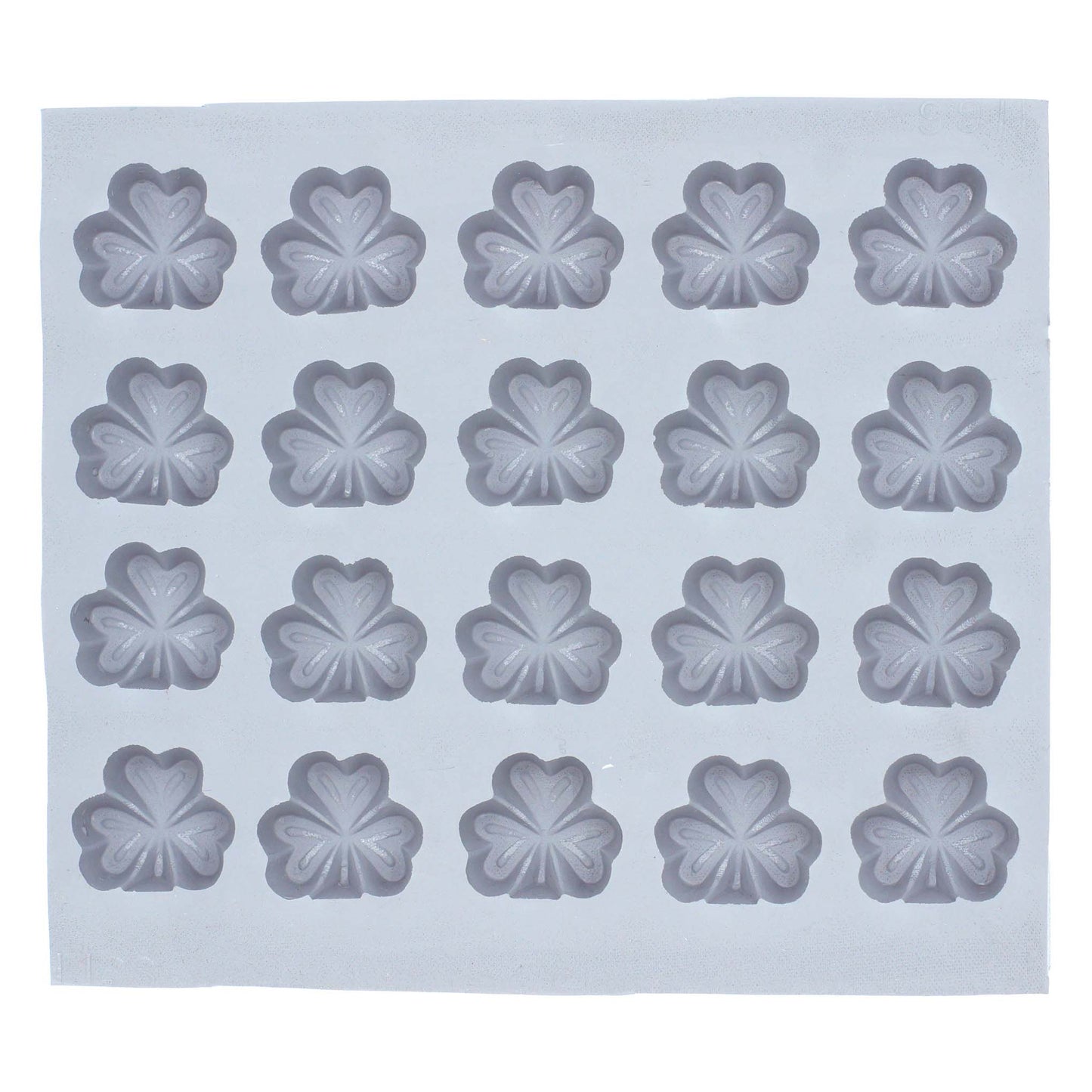 Full mold sheet with multiple shamrock cavities ideal for making festive candies and themed crafts