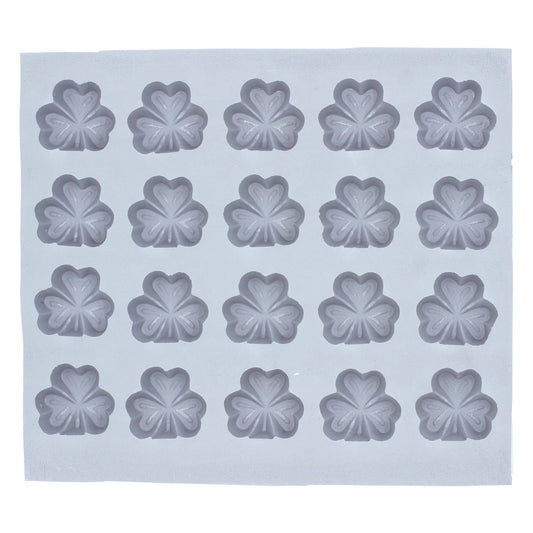 Full mold sheet with multiple shamrock cavities ideal for making festive candies and themed crafts