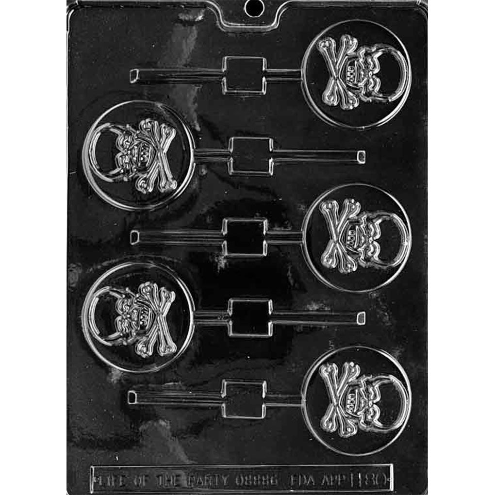 Clear chocolate lollipop mold with six round cavities featuring a raised skull and crossbones design on a dark background.