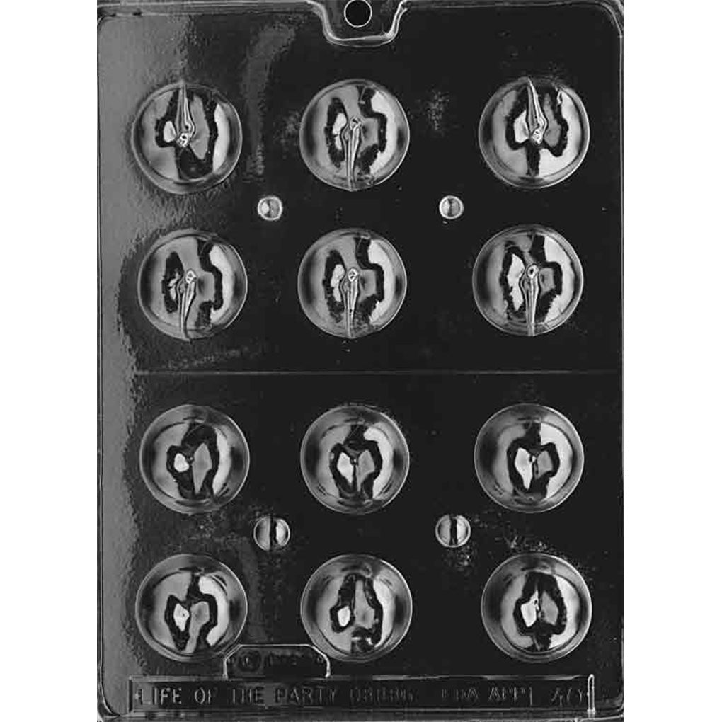 Clear chocolate mold with small round apple cavities, including top and bottom halves for making 3D apple-shaped chocolates.