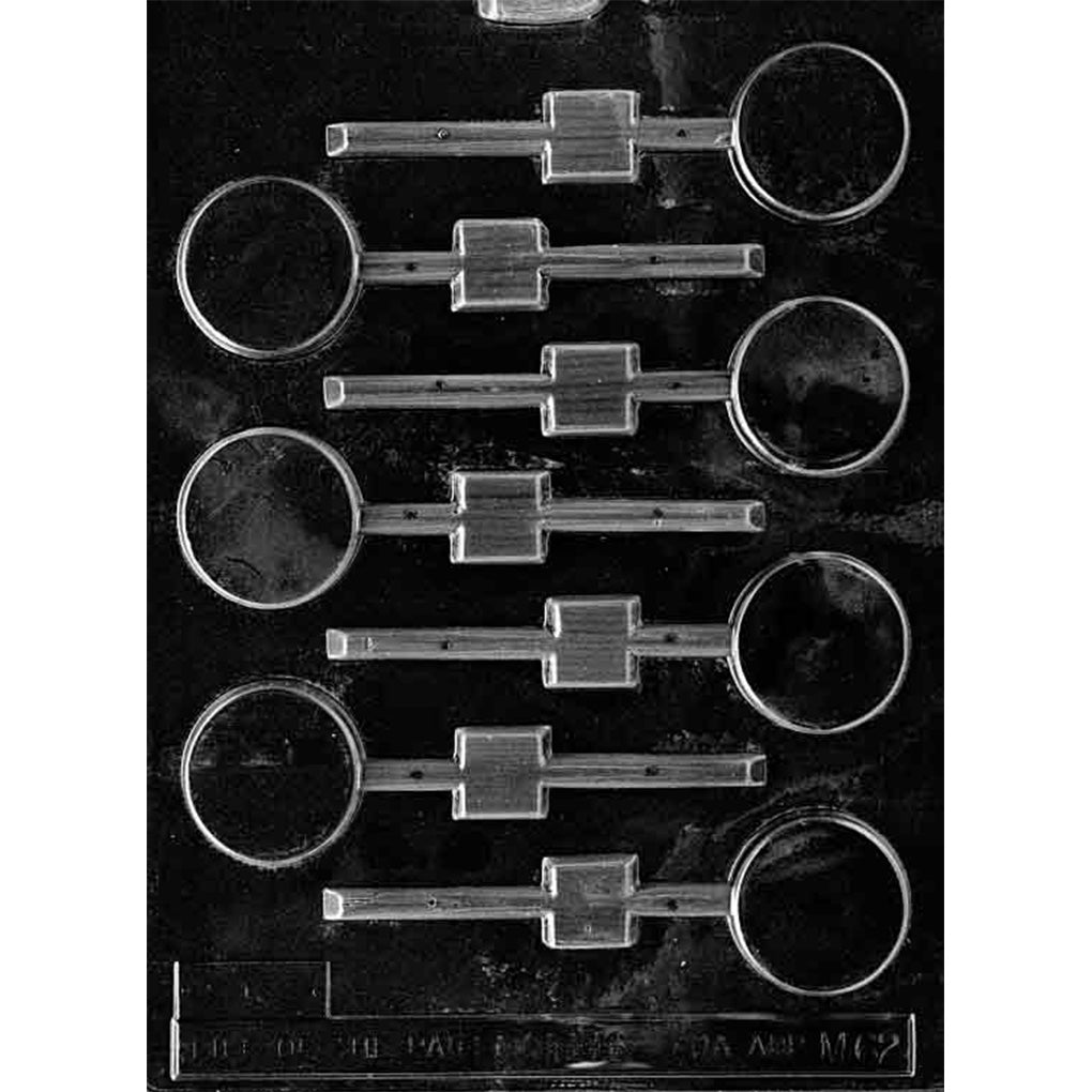 Chocolate lollipop mold with seven plain 1 1/2-inch round cavities arranged in alternating directions with horizontal stick channels.
