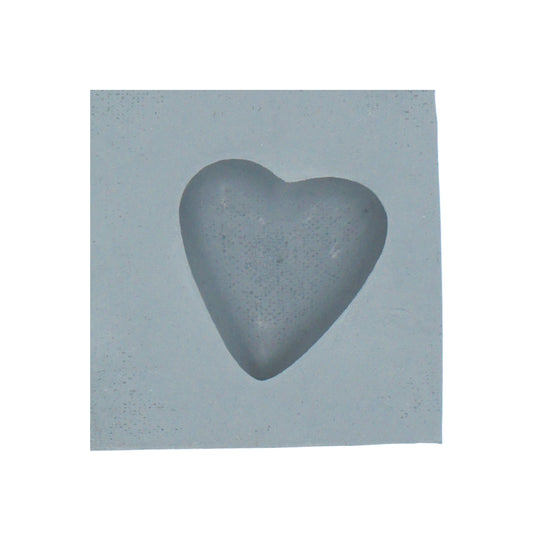 Close-up of a single cavity in a heart-shaped rubber mint mold, ideal for crafting small heart-shaped candies or decorative treats.