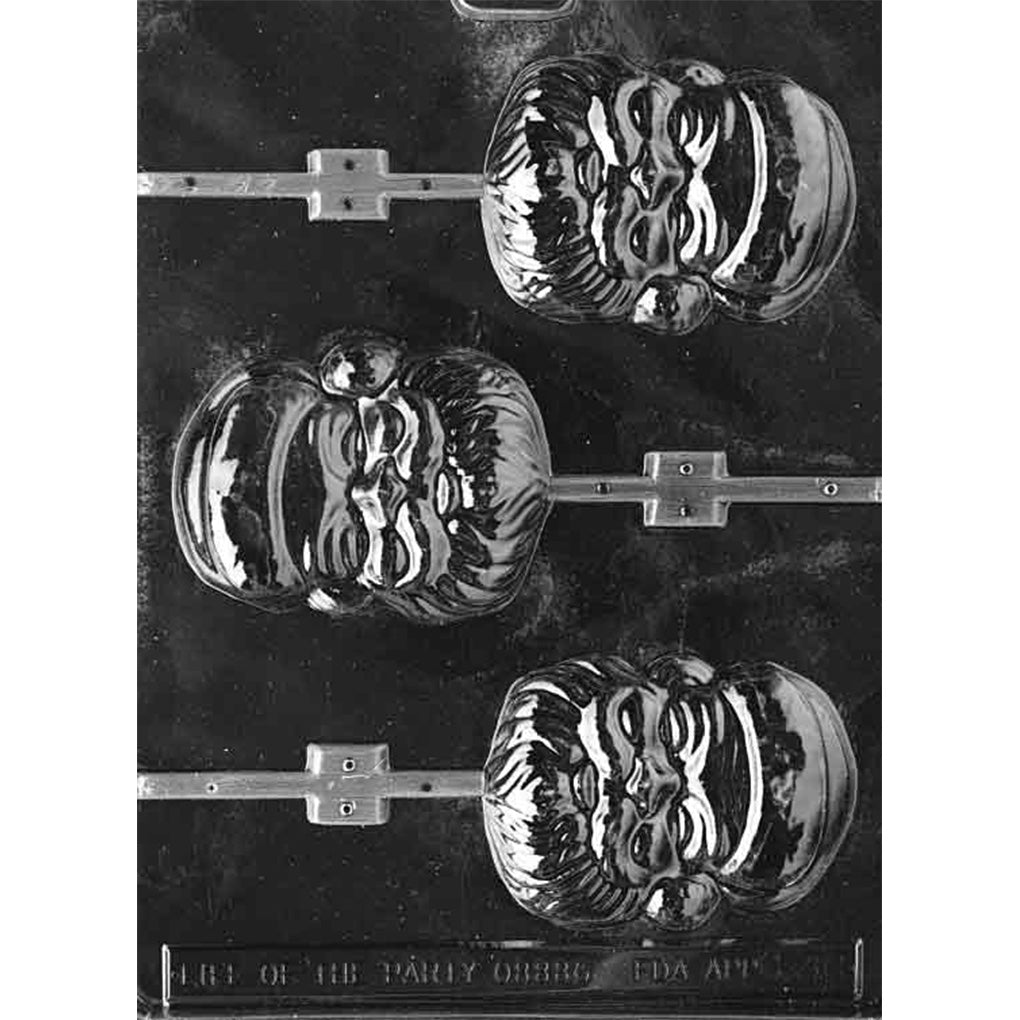 Clear plastic chocolate lollipop mold with three large Santa face cavities showing a smiling Santa with a hat and textured beard, each connected to a stick channel; shown on a dark background.