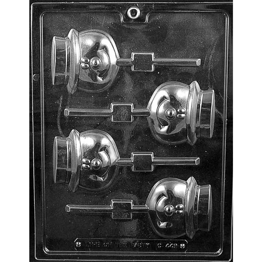 Clear plastic chocolate lollipop mold with four snowman head cavities featuring a smiling face and top hat, each with a built-in lollipop stick channel, on a dark background.