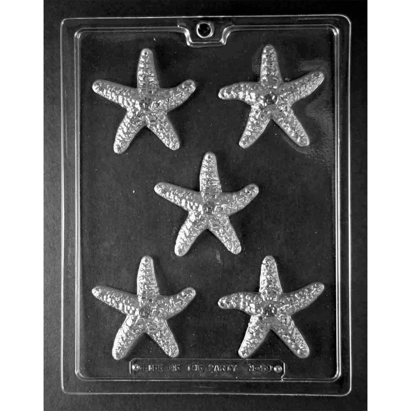 Clear chocolate mold tray with five textured starfish cavities arranged on a black background, each featuring five arms and a bumpy natural surface.