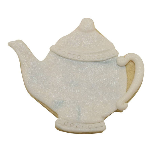 Decorated teapot cookie with shimmering white icing and elegant details.