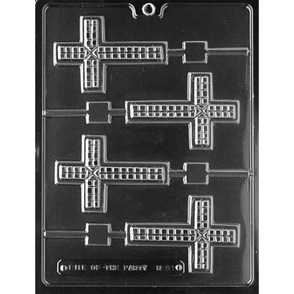 Clear plastic chocolate lollipop mold photographed on a dark background with four cross-shaped cavities featuring a grid-like textured surface and built-in stick channels.