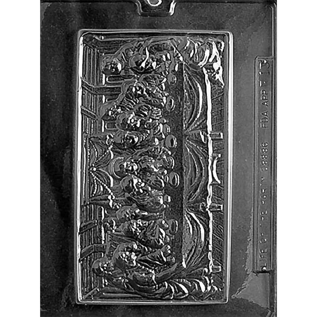 Plastic chocolate mold with a single rectangular cavity featuring a detailed embossed Last Supper scene.