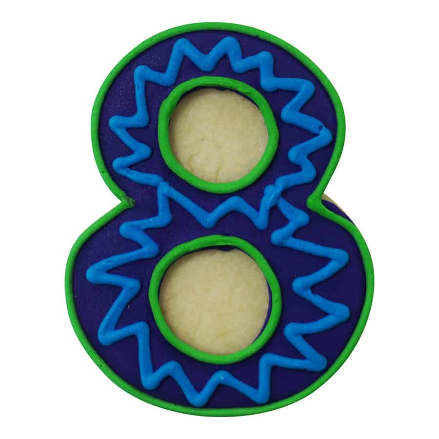 Decorated sugar cookie shaped like the number 8, featuring blue and green icing with a zigzag pattern and cutout centers.