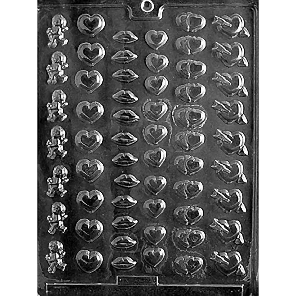Clear plastic Valentine chocolate mold photographed on a black background, featuring rows of tiny assorted cavities including cupid figures, hearts, lips, linked hearts, and hearts with arrows.