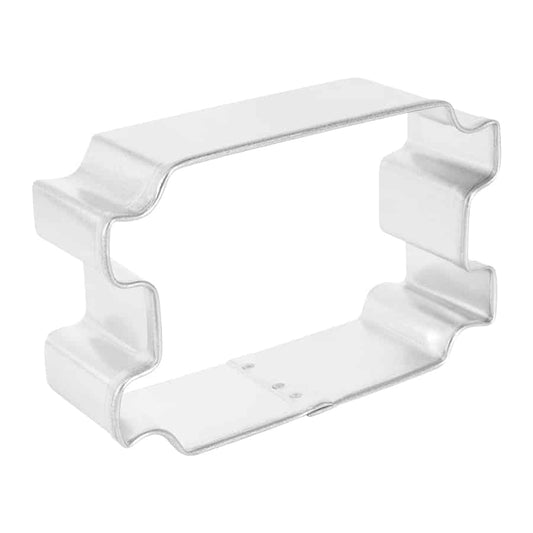 Angled view of a Torah scroll cookie cutter, showcasing its sturdy structure and detailed shape designed for Hanukkah, bar mitzvahs, and other Judaic celebrations.