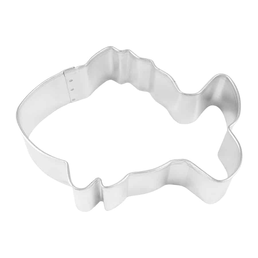 Metal tropical fish cookie cutter with wavy fin details, photographed from a top-down angle.