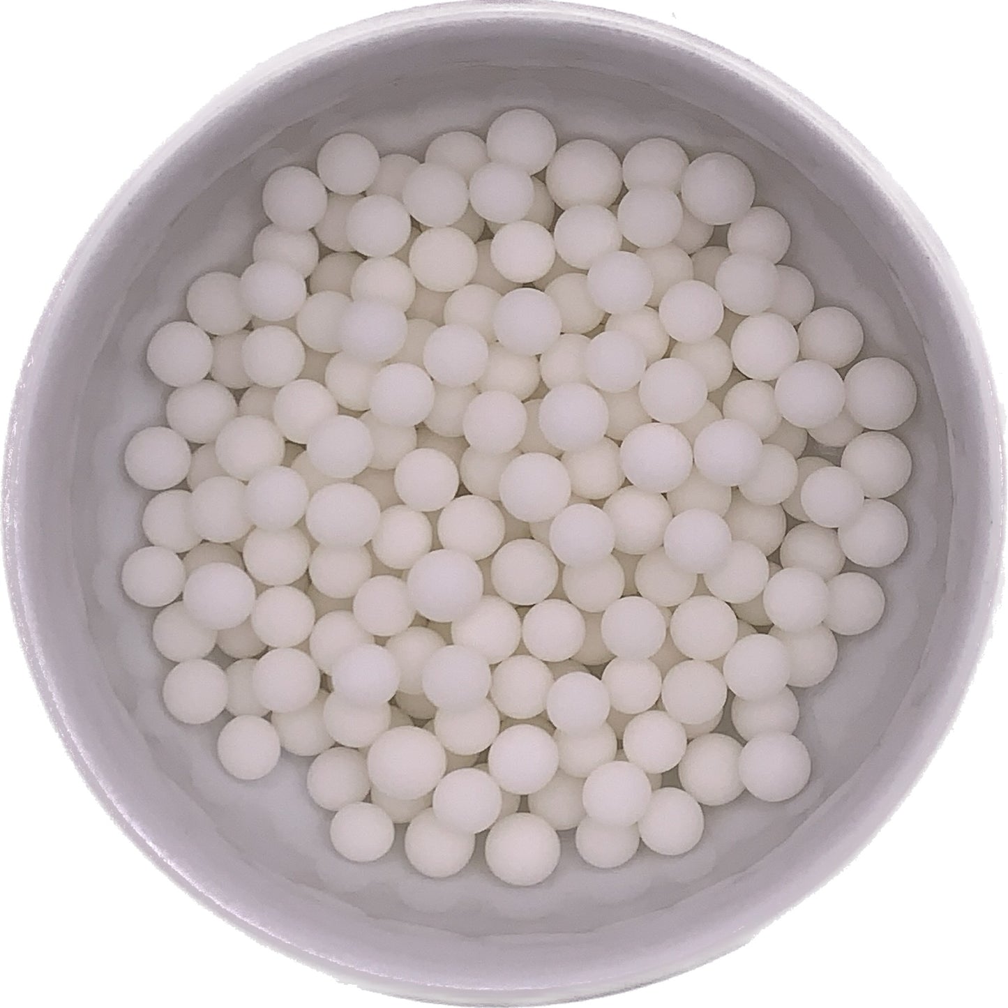 Bowl of white/ivory non-pearlized 6mm sugar pearls with a matte finish, ideal for decorating cakes, cupcakes, and cookies.