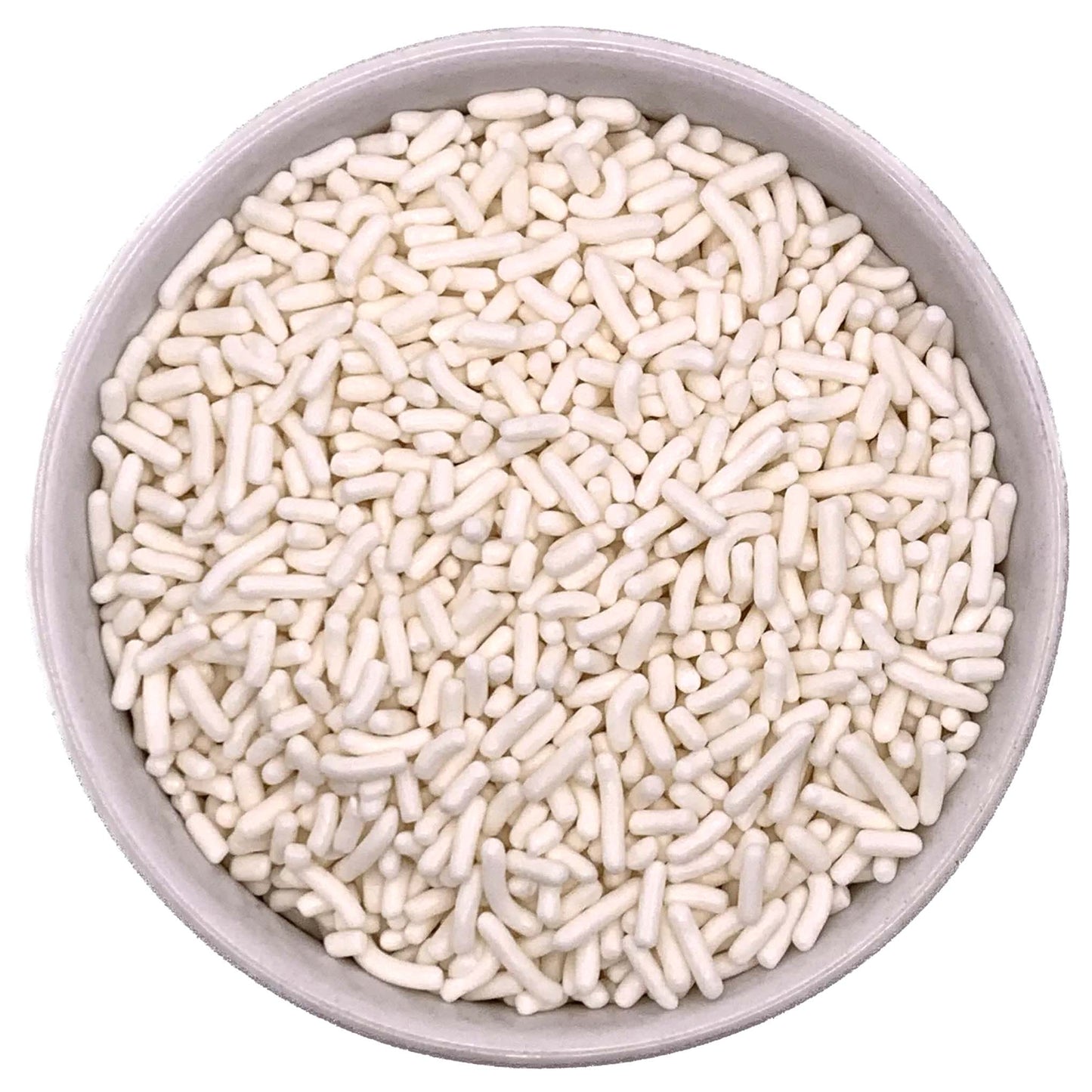 Top-down view of a round bowl filled with white jimmies sprinkles, showing short matte-white rod shapes packed closely together.
