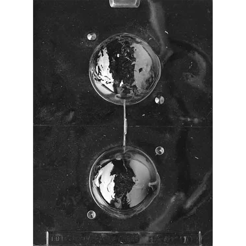 Clear plastic chocolate mold with two circular globe cavities arranged vertically, each showing raised continent shapes for a 3D world sphere.