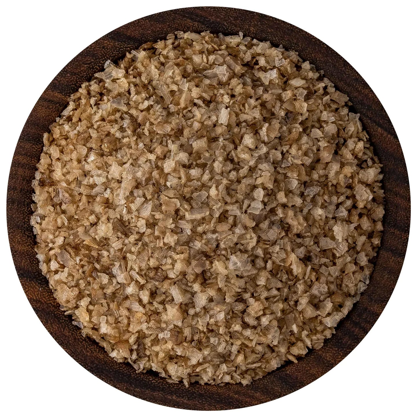 Overhead view of applewood smoked sea salt in a round dark wooden bowl, showing tan-brown flake crystals with uneven, rustic texture.