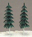 A pair of miniature evergreen fir trees, designed as cake toppers or cupcake picks, ideal for creating a wintry scene or enhancing outdoor-themed cake decorations.