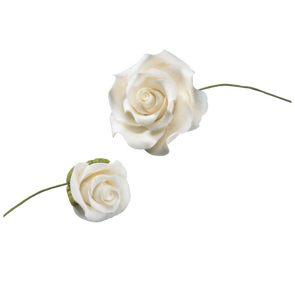 White gum paste rose cake decorations with realistic petal details and attached floral wires, shown in two sizes for wedding or celebration cakes.