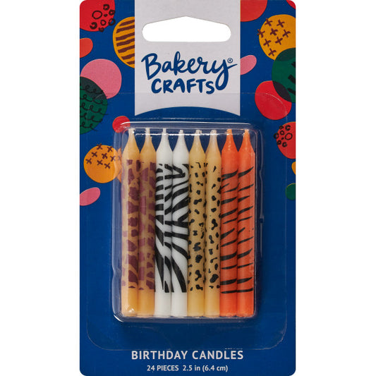 Pack of 24 animal print birthday candles in zebra, leopard, and tiger patterns with orange, yellow, and white coloring, displayed in Bakery Crafts packaging.