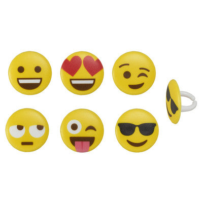 Assorted yellow emoji cupcake rings with expressions like heart eyes, winking, sunglasses, and tongue out on a white background.