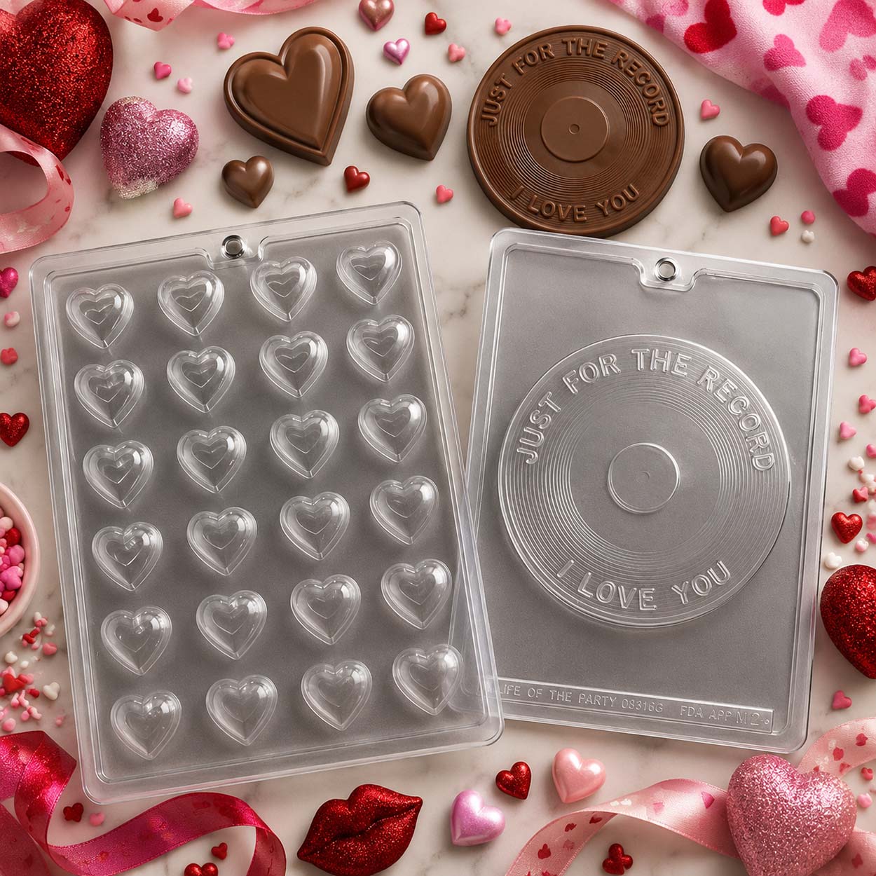 Valentine's Day chocolate molds with mini hearts and an "I Love You" record, plus finished heart and record chocolates on a festive background.