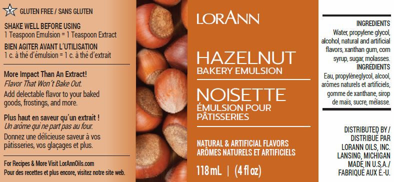 Label of LorAnn Oils Hazelnut Bakery Emulsion, gluten-free, designed to infuse a nutty hazelnut taste into baked items. Lists water, propylene glycol, and natural and artificial flavors as ingredients. The label suggests a strong flavor profile and provides a website for additional recipes. The packaging is in both English and French and contains 118 ml (4 fl oz).