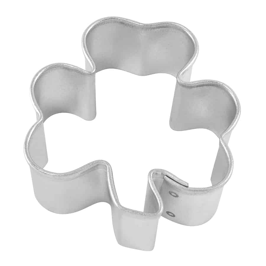 1.5-inch mini shamrock cookie cutter with a smooth and compact design for festive treats.