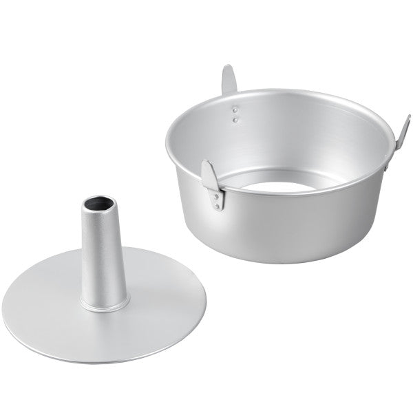 Disassembled Wilton 10-inch Angel Food Cake Tube Pan with removable bottom and built-in cooling feet.