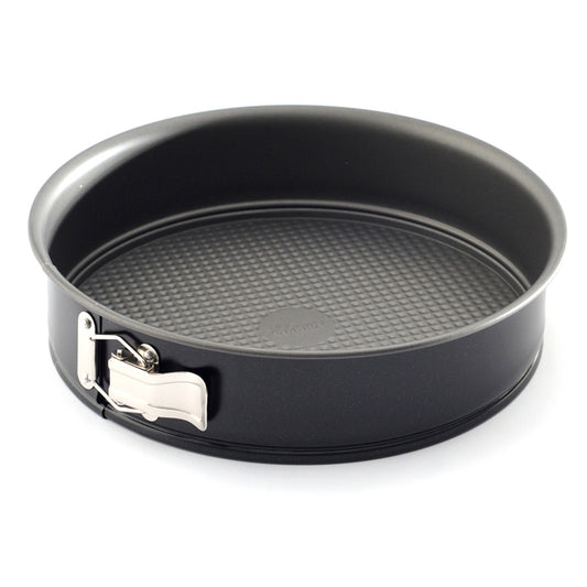 Black 10-inch nonstick springform pan with tall round sides, textured removable base, and silver spring latch photographed on a white background.