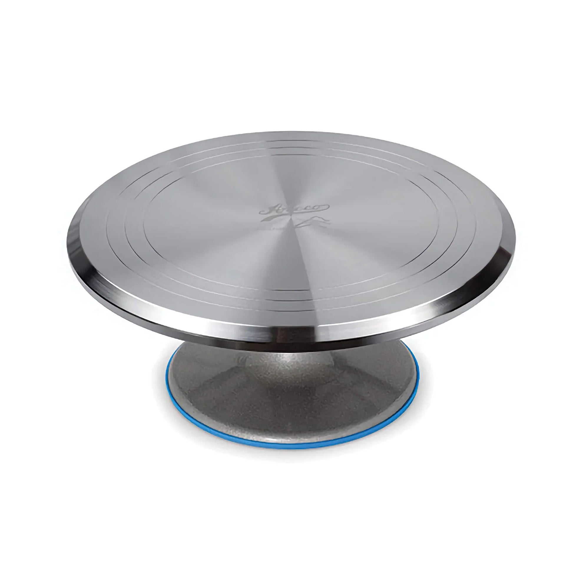 Ateco 12-inch aluminum cake decorating turntable with a brushed silver round top, concentric guide rings, raised pedestal base, and blue non-slip silicone edge.