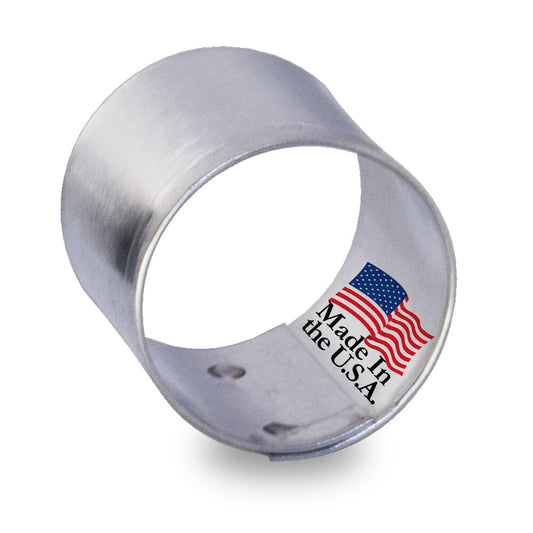 Close-up of a stainless steel circle cookie cutter with a "Made in the U.S.A." label and an American flag printed on the side.