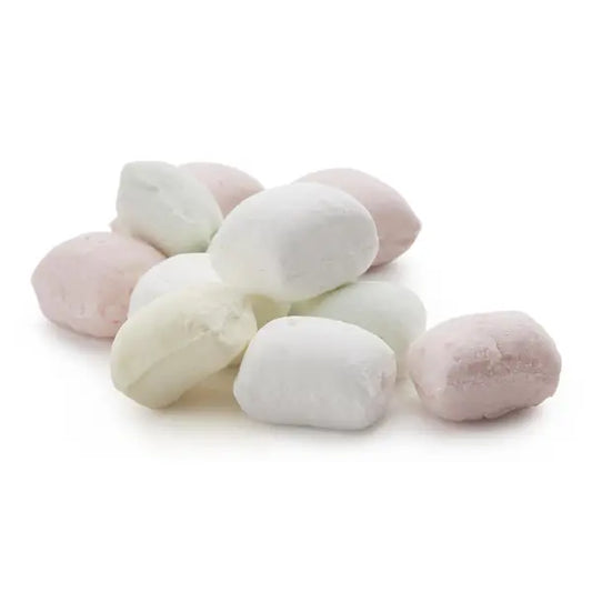 Pastel-colored butter mints on a white background