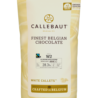 A bag of Callebaut Finest Belgian Chocolate, featuring white chocolate callets with 28.3% cocoa solids, crafted in Belgium for high-quality baking and chocolate-making.