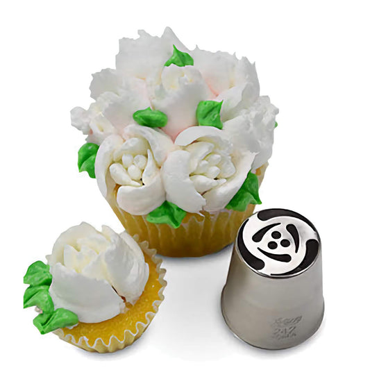 Cupcake adorned with beautifully crafted white and pink frosting roses made with Russian Piping Tip #242. The metal piping tip is shown beside the cupcake, highlighting its detailed pattern.