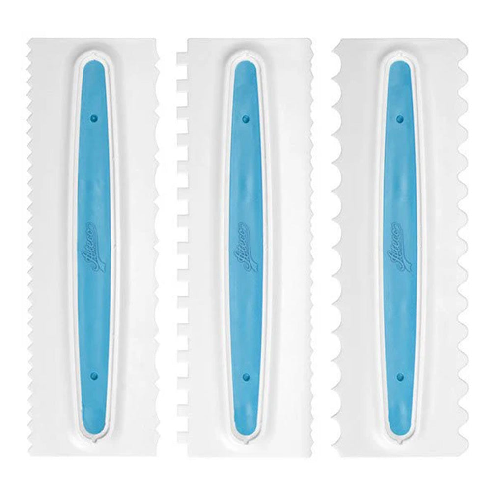 Three white icing combs with blue grip centers, each showing a different textured edge pattern for creating stripes, ridges, and waves in buttercream.