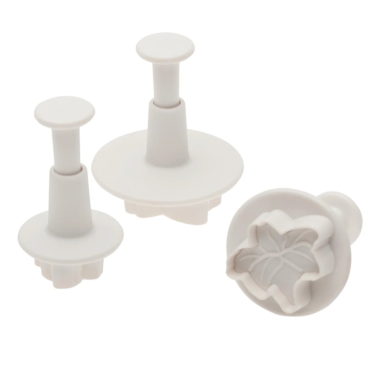 Ateco 1952 3-piece lily plunger cutter set with three different sizes, made of white plastic.