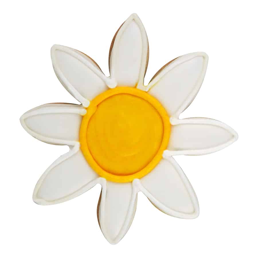 Decorated flower-shaped cookie with a yellow center and white petals.