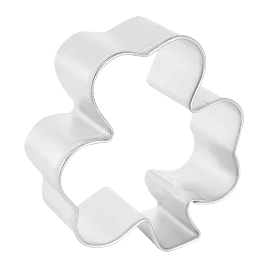 Side angle of the shamrock cookie cutter, showcasing its rounded edges.