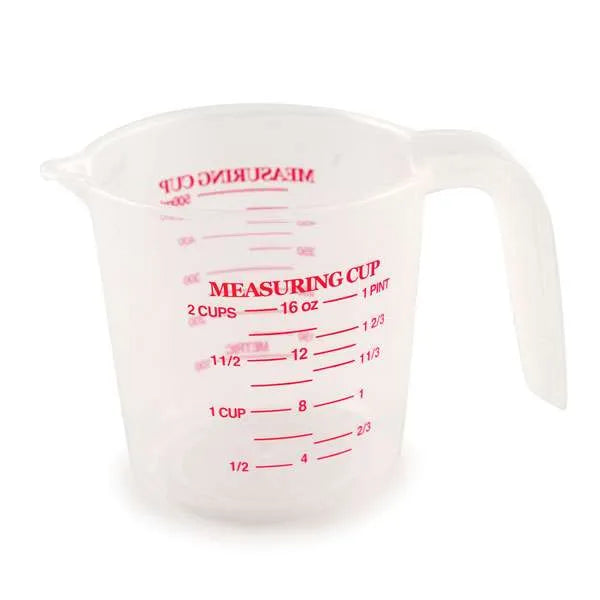 Medium transparent plastic measuring cup with red markings showing measurements in milliliters and cups, specifically labeled up to 16 ounces or 2 cups.