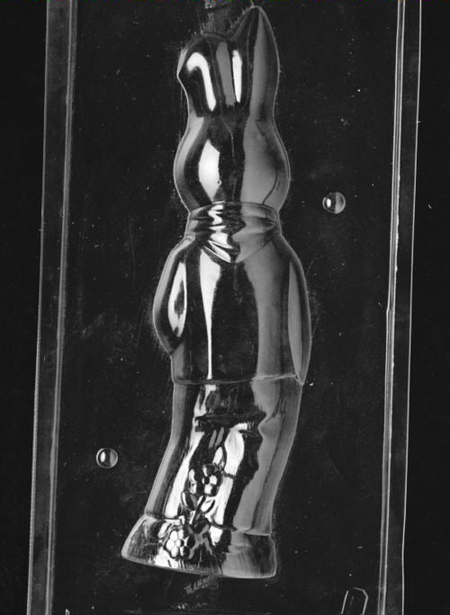 Clear plastic chocolate mold showing the back half of a tall bunny figure with smooth contours and matching outline, designed to pair with the front half for a complete 3D chocolate bunny.