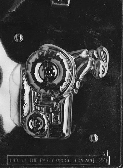 Clear plastic chocolate mold showing the front half of a bunny driving a tractor, with raised details on the bunny’s face, ears, and large tractor wheels.