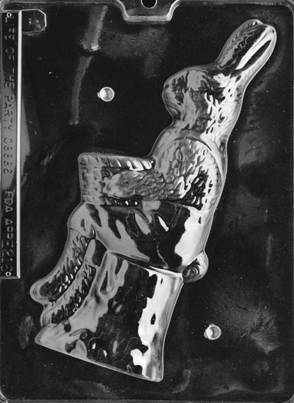 Clear plastic chocolate mold showing the front half of a tall bunny sitting on a tree stump, with textured fur and stump grain details.