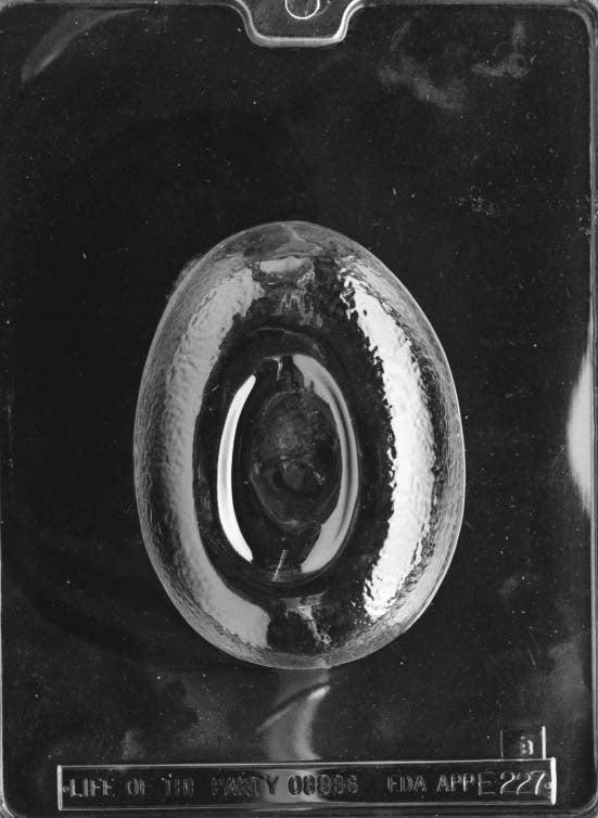 Clear plastic chocolate mold showing the back half of an egg-shaped cavity with a smooth oval center and lightly textured surface, designed to pair with the bunny scene front.