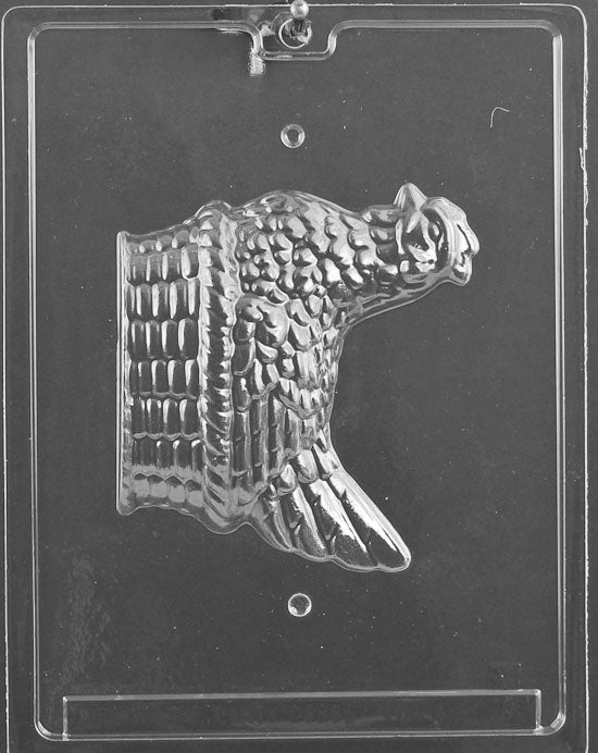 Clear plastic mold showing one side of a hen resting in a basket, with feather and weave textures.